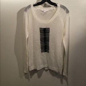 Like new black and white sweater